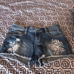 Medium wash with white print distressed shorts